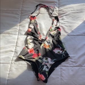 Plunge one piece bathing suit
